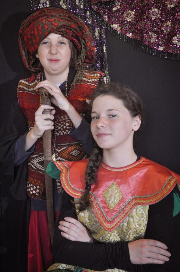 The Magician and sidekick in Aladdin play.