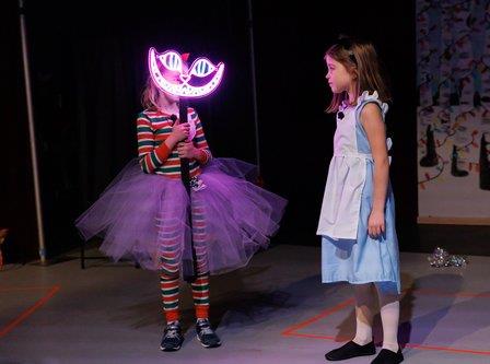 Children perform in Christmas Alice in Wonderland Musical